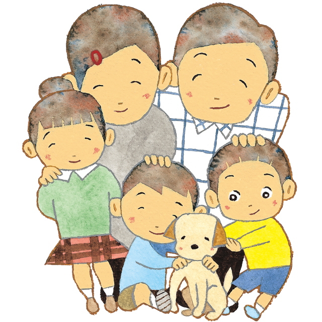 ラブラドールの赤ちゃん犬と遊ぶ子供たち嬉しそうに見つめているパパとママ